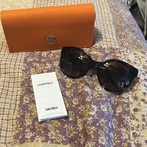 Tory Burch sunglasses. Tortoise shell. New without tags. Never been worn.